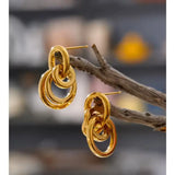 Boucles d’oreilles dorées acier inoxydable – Multi-anneaux PVD