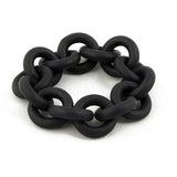 Bracelet upcyclé caoutchouc noir en anneaux larges, fabriqué à partir de pneus recyclés, design moderne et durable